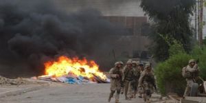 صور جديدة لجنود أميركيين يحرقون جثث عراقيين