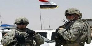 قوات أمريكية تساعد الجيش العراقي في مد جسر على نهر دجلة لاستعادة الموصل